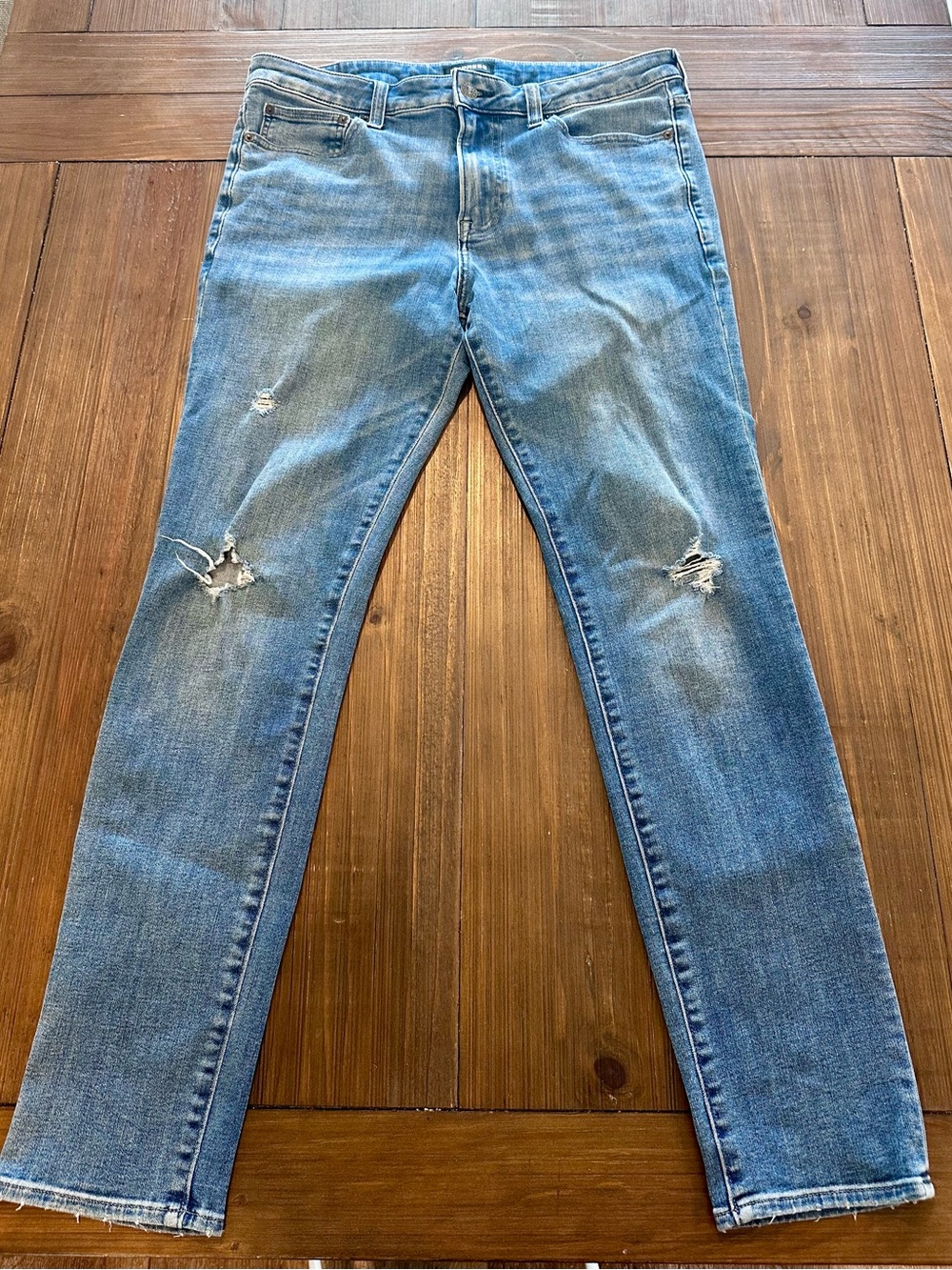 Express Men's Light Blue Skinny Jeans with Distressed Knees
